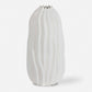 Large white organic vase with curved lines.