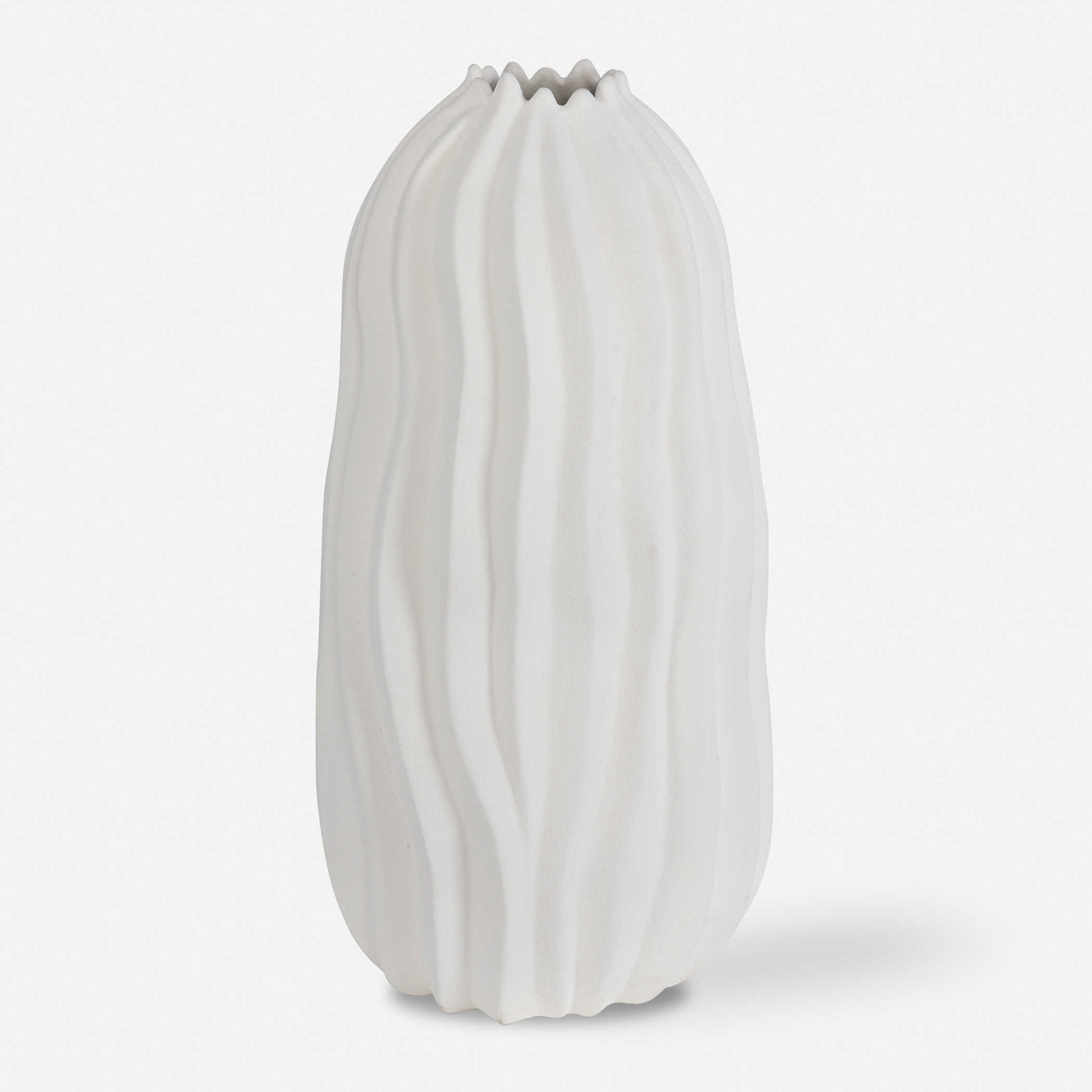 Large white organic vase with curved lines.