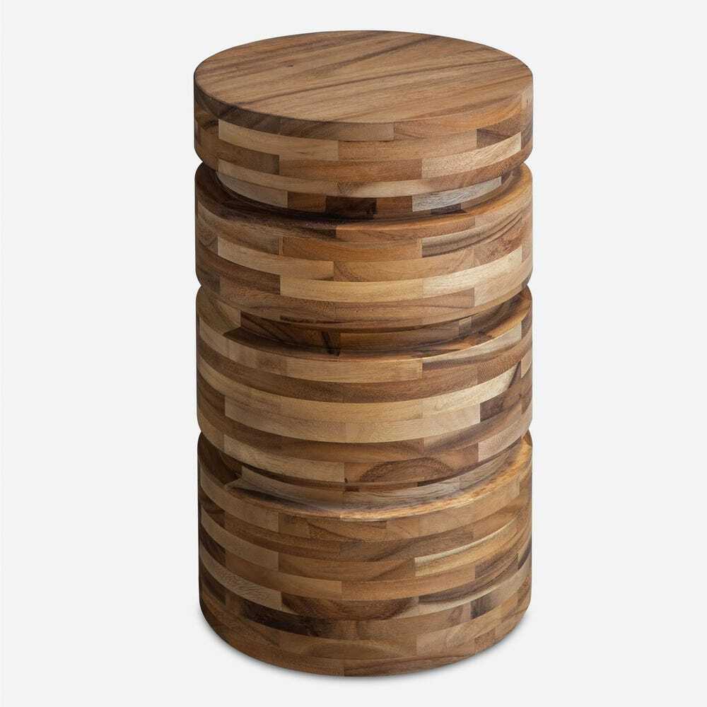 Wooden side table with stacked circular designs on a white background