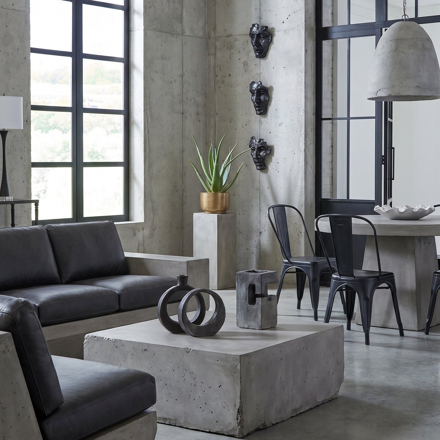 Modern living room with concrete furniture and decor