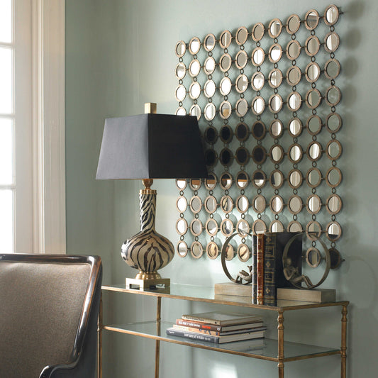 Mirrored Art on Blue Wall.
