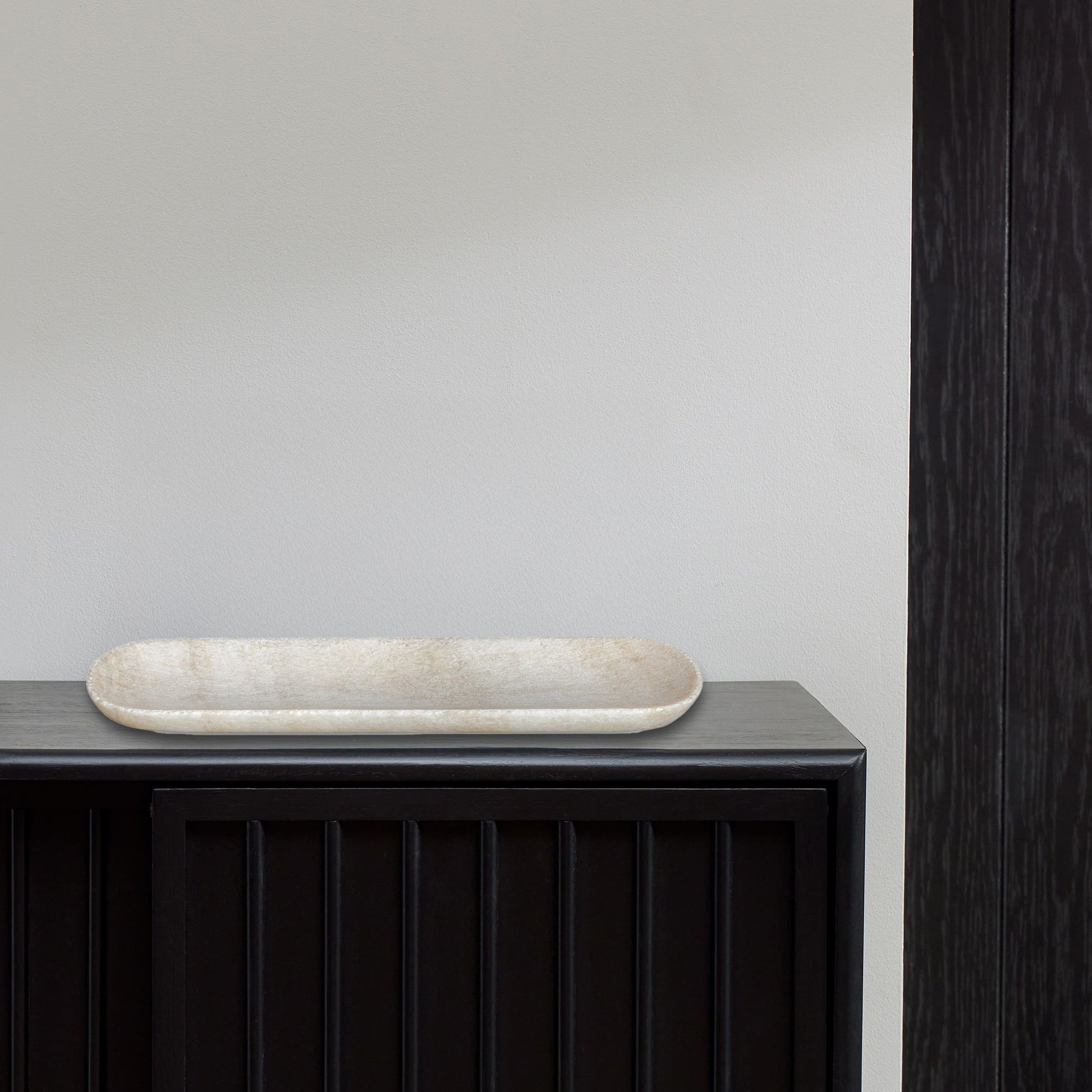 Stone Tray on Modern Black Console Table.