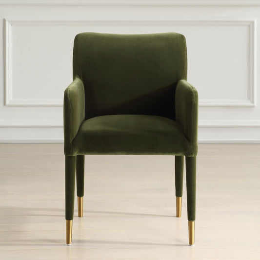 Green armchair with gold legs on a white background