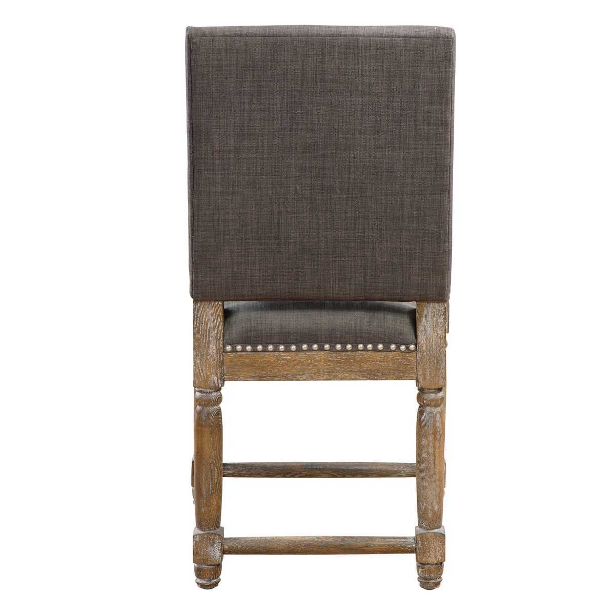 Wooden bar stool with a dark upholstered seat and backrest on a white background