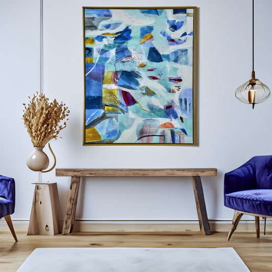 Narrow entryway bench in living room under a colorful painting with a decorative blue armchair off to the side.
