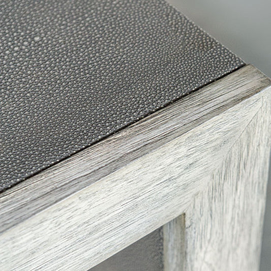 Console table with decorative items in a room setting