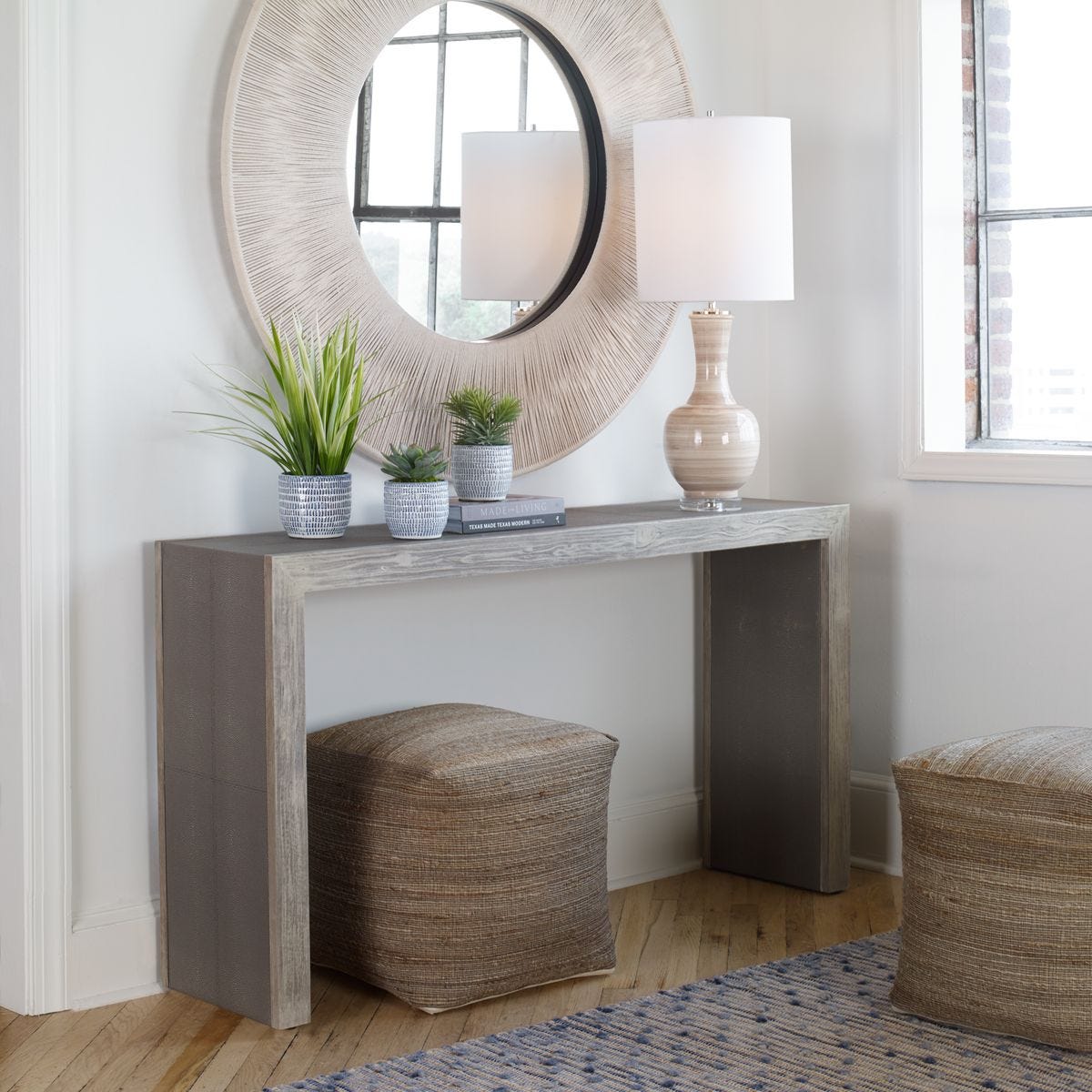 Console table with decorative items in a room setting