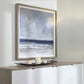 Ocean Abstract painting above white console and tray of candles in a living room.