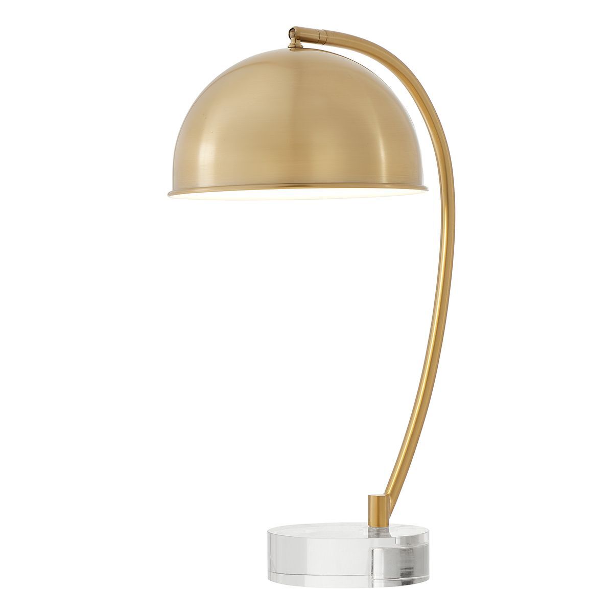 Gold table lamp with a clear base on a white background