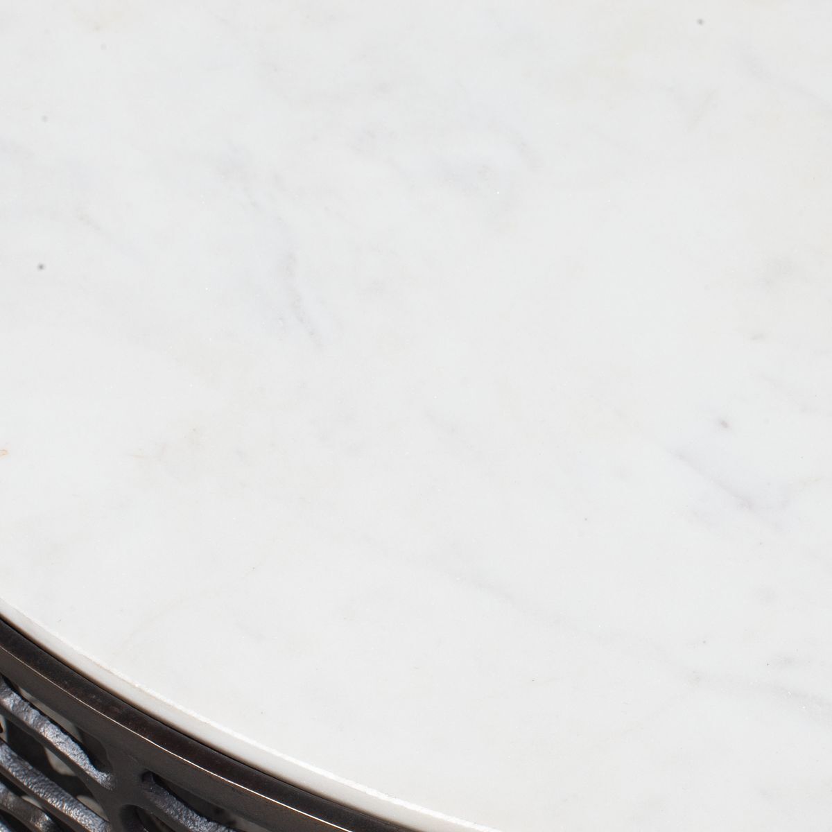 Close-up of a white ceramic plate with a blurred background