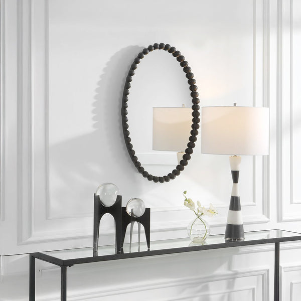 Narrow mirrored console with glass top.