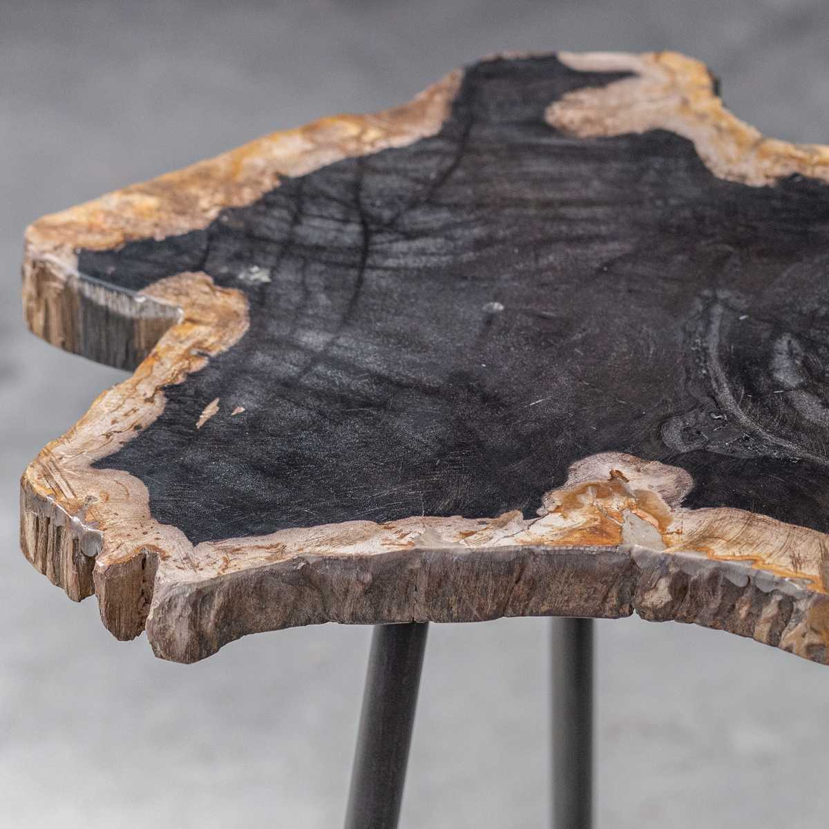 Wooden table with natural edge design on a gray background