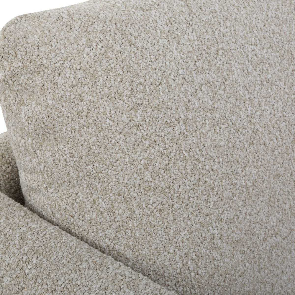 Close-up of textured beige fabric with a slight pattern