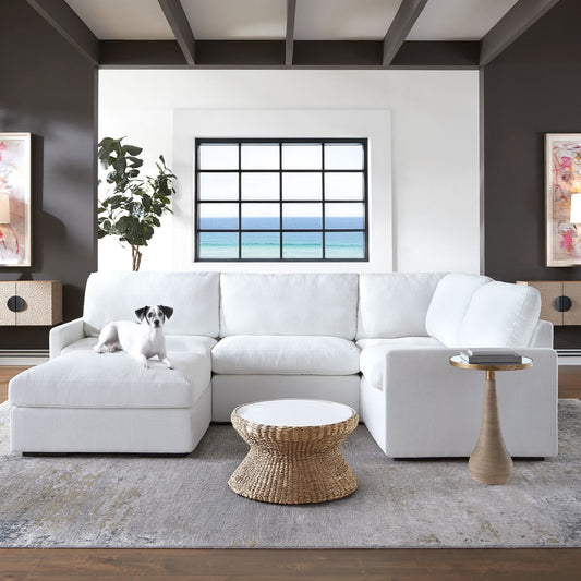 White sofa with rattan accessories.