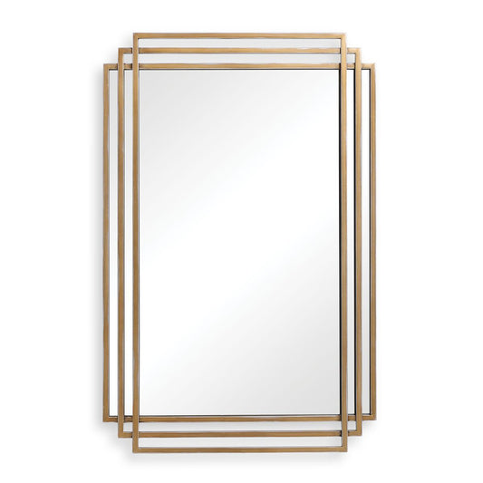 Decorative mirror with gold frame on a white wall above a console table with decorative items.