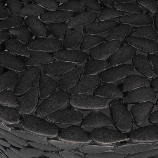 Black woven ottoman on a white background