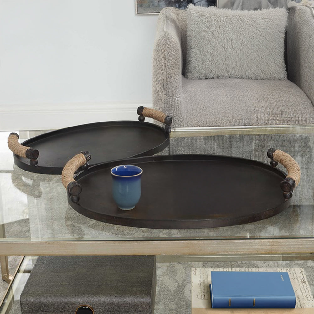 Round Black Iron Trays on Glass Coffee Table.