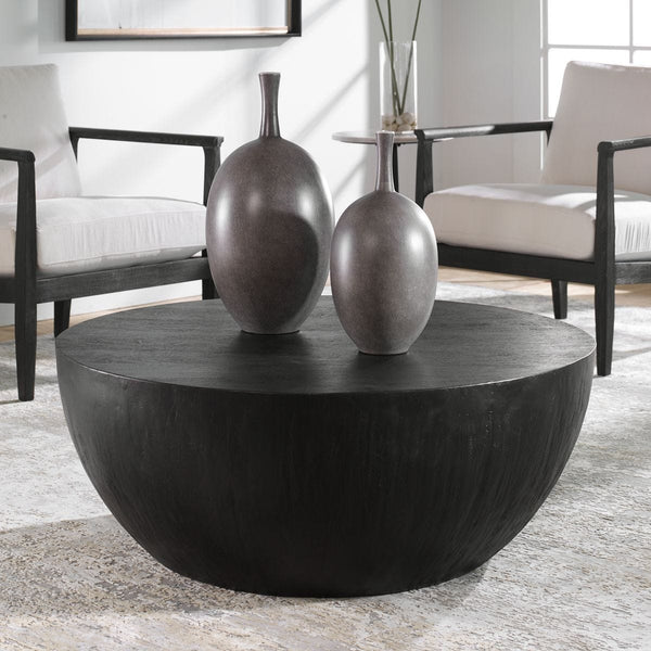 Round mango wood coffee table.