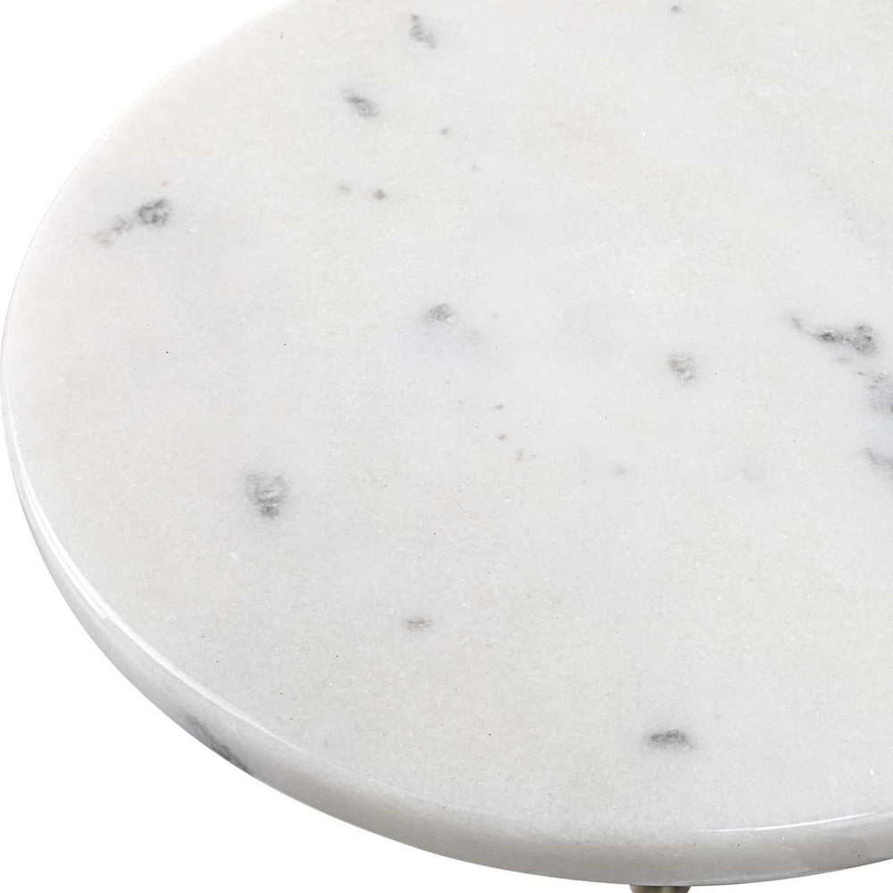 Round marble table top with gray veining on a white background