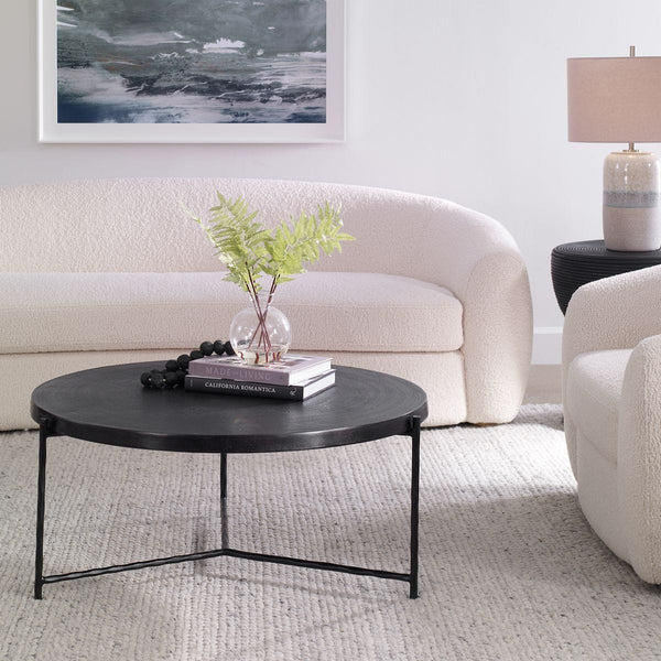 Round metal coffee table.