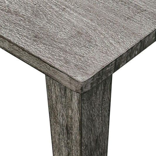 Outdoor gray dining table with chairs.