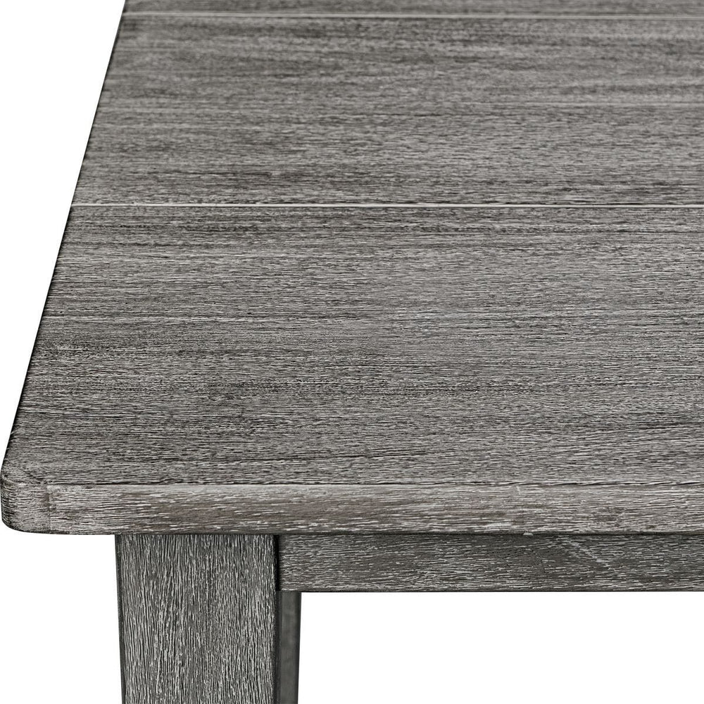 Gray wash mahogany wood surface of dining table.
