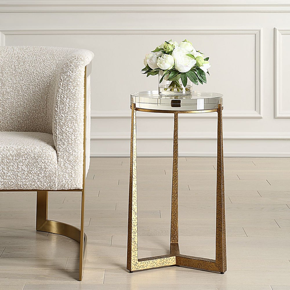 Small side drink table with crystal top and antique gold base.