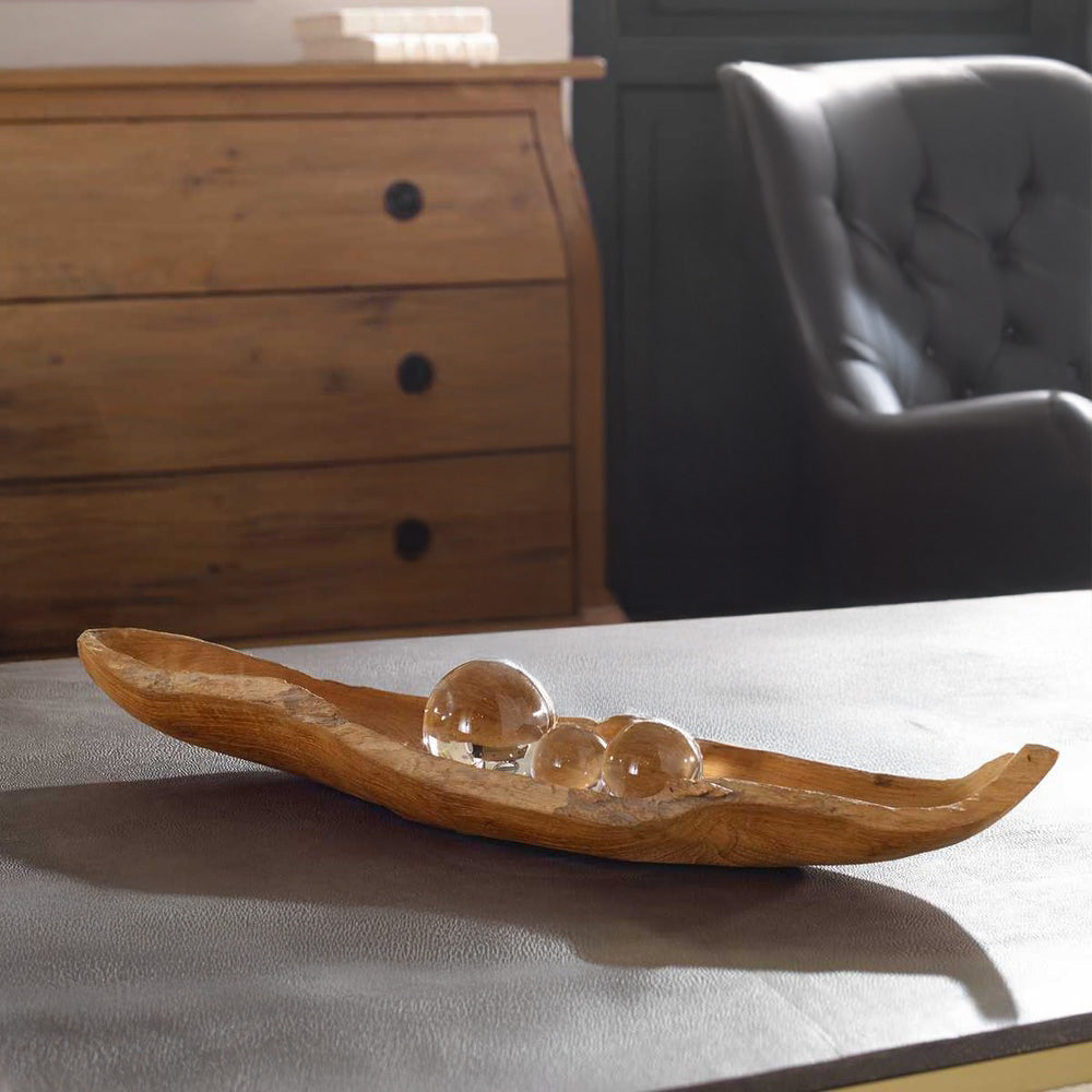 Teak bowl with orbs.