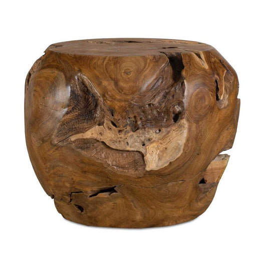 Wooden round teak stool with a natural, textured surface in a minimalistic room.