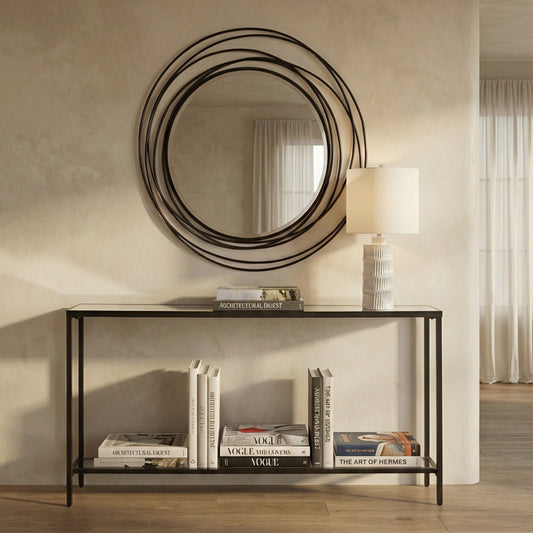 Angled thin black console table.