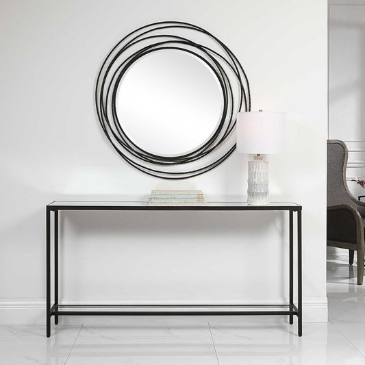 Angled thin black console table.