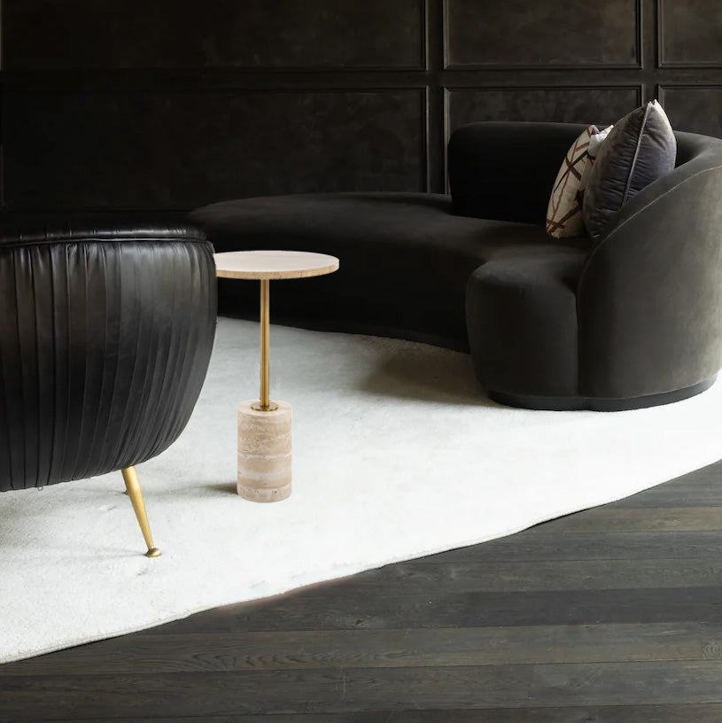 Modern Travertine accent table in Dark Modern Room.