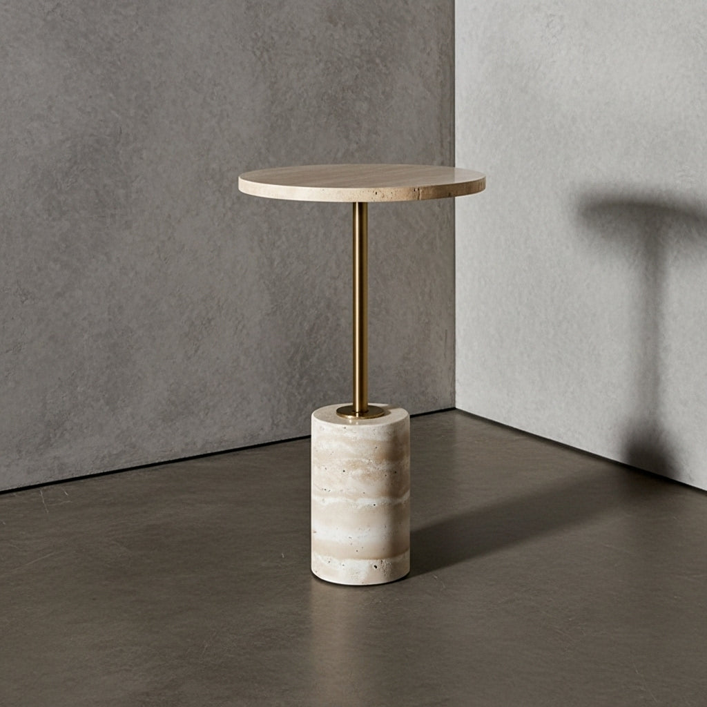 Small round table with wooden top and marble base against a gray wall.