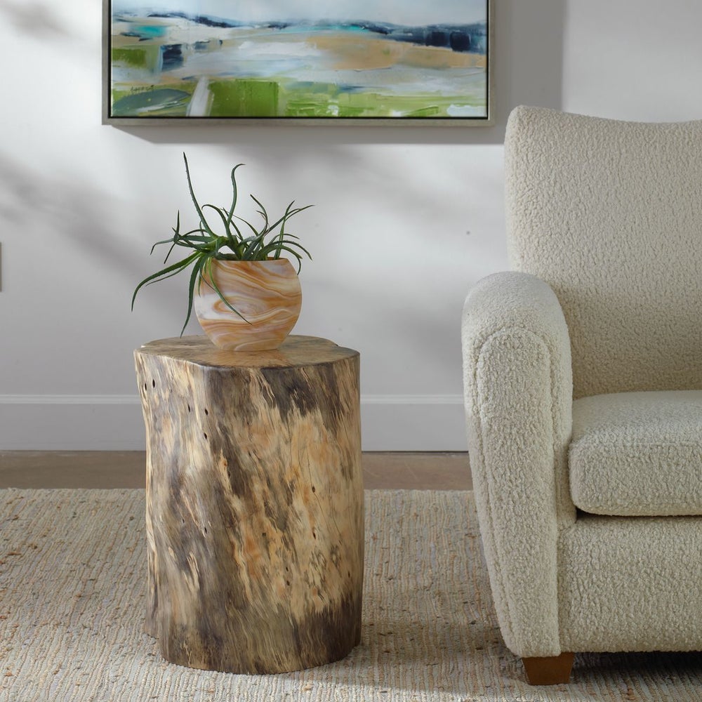 Tree stump accent table.