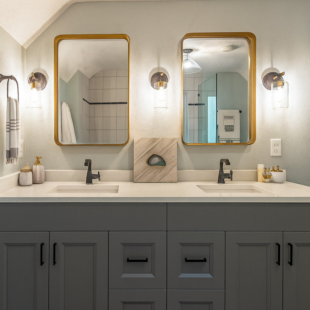Bathroom with double vanity, mirrors, and decorative elements.