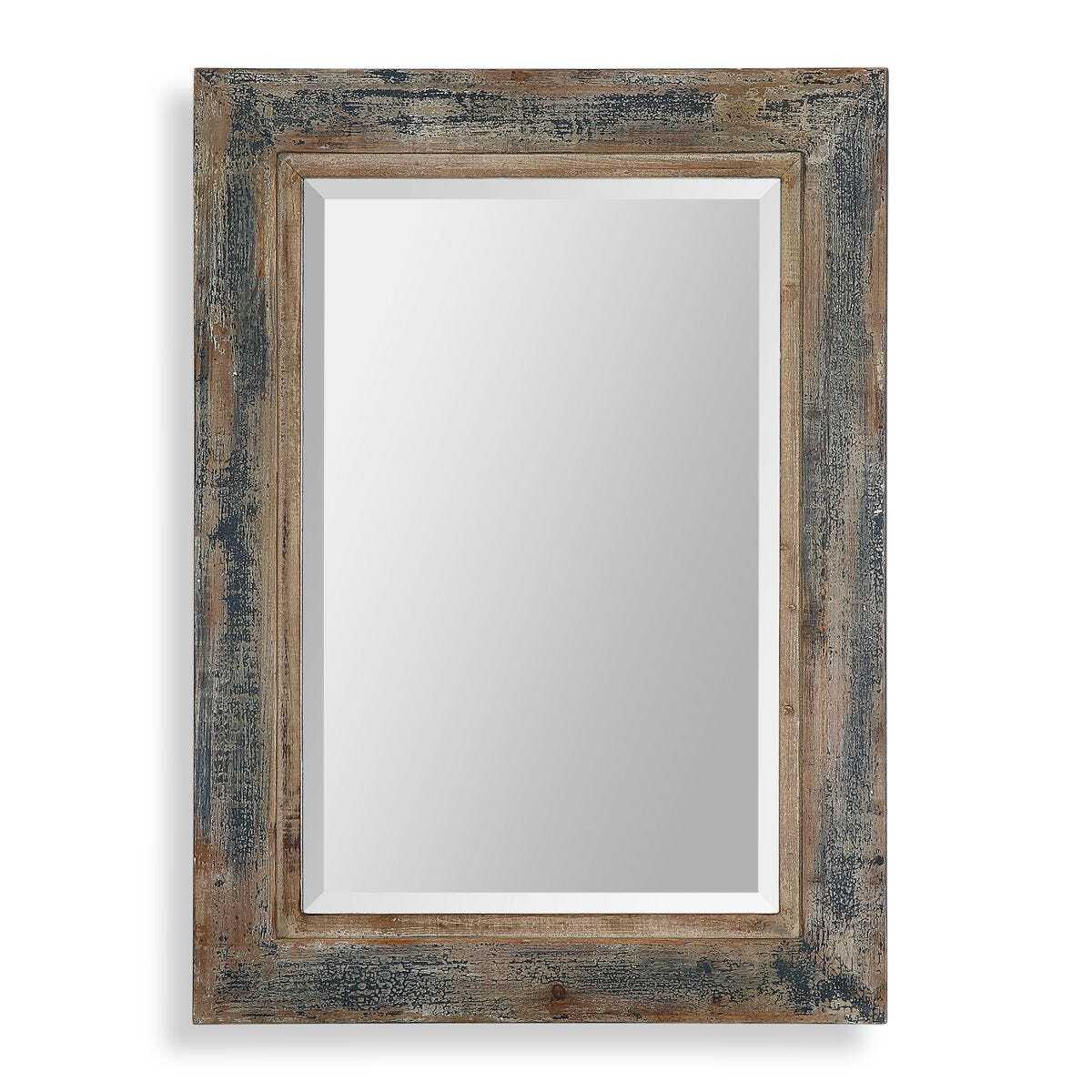 Rectangular mirror with a rustic wooden frame on a white background