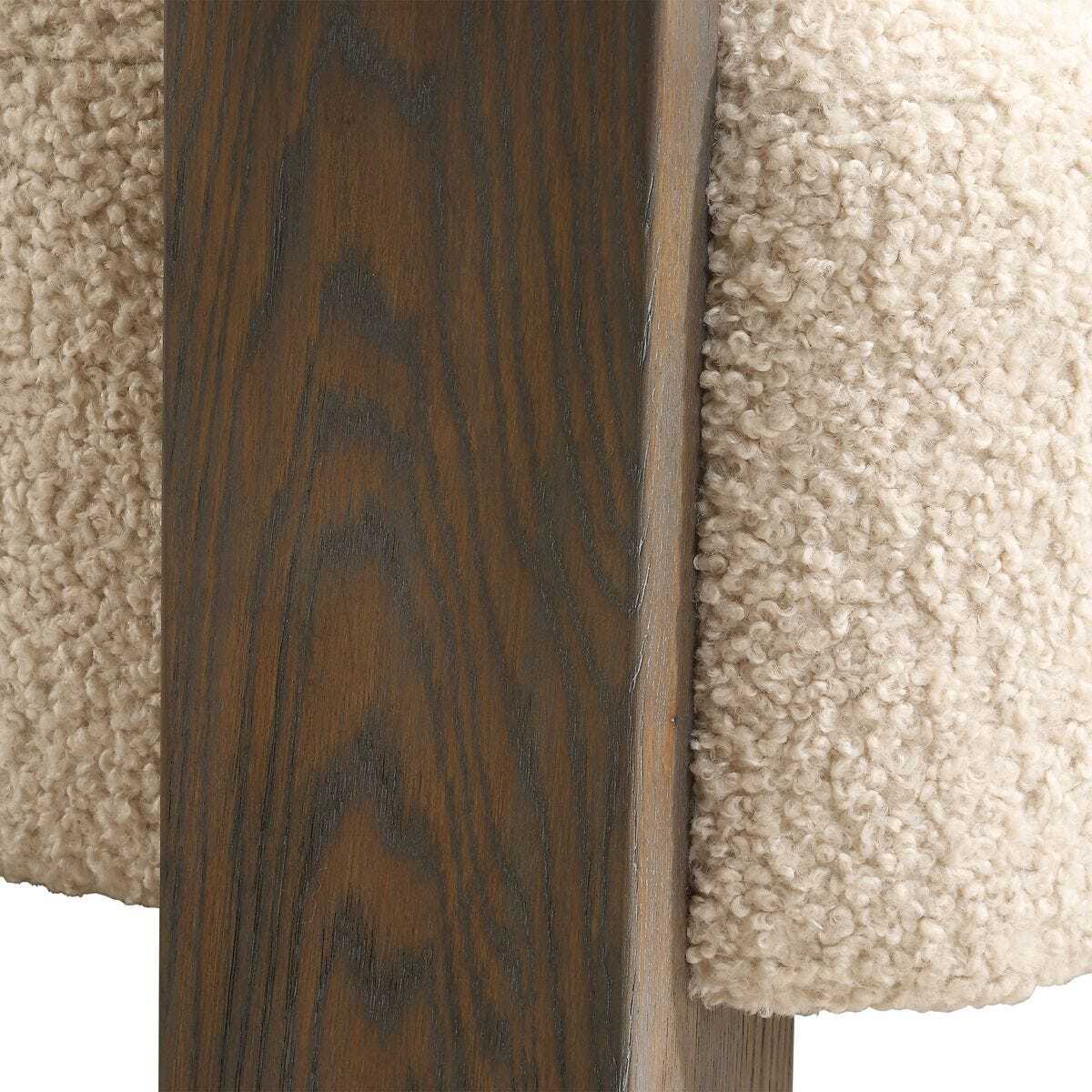 Close-up of a textured surface with wooden and fabric elements.