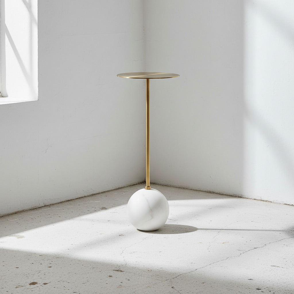 White and brass end table.