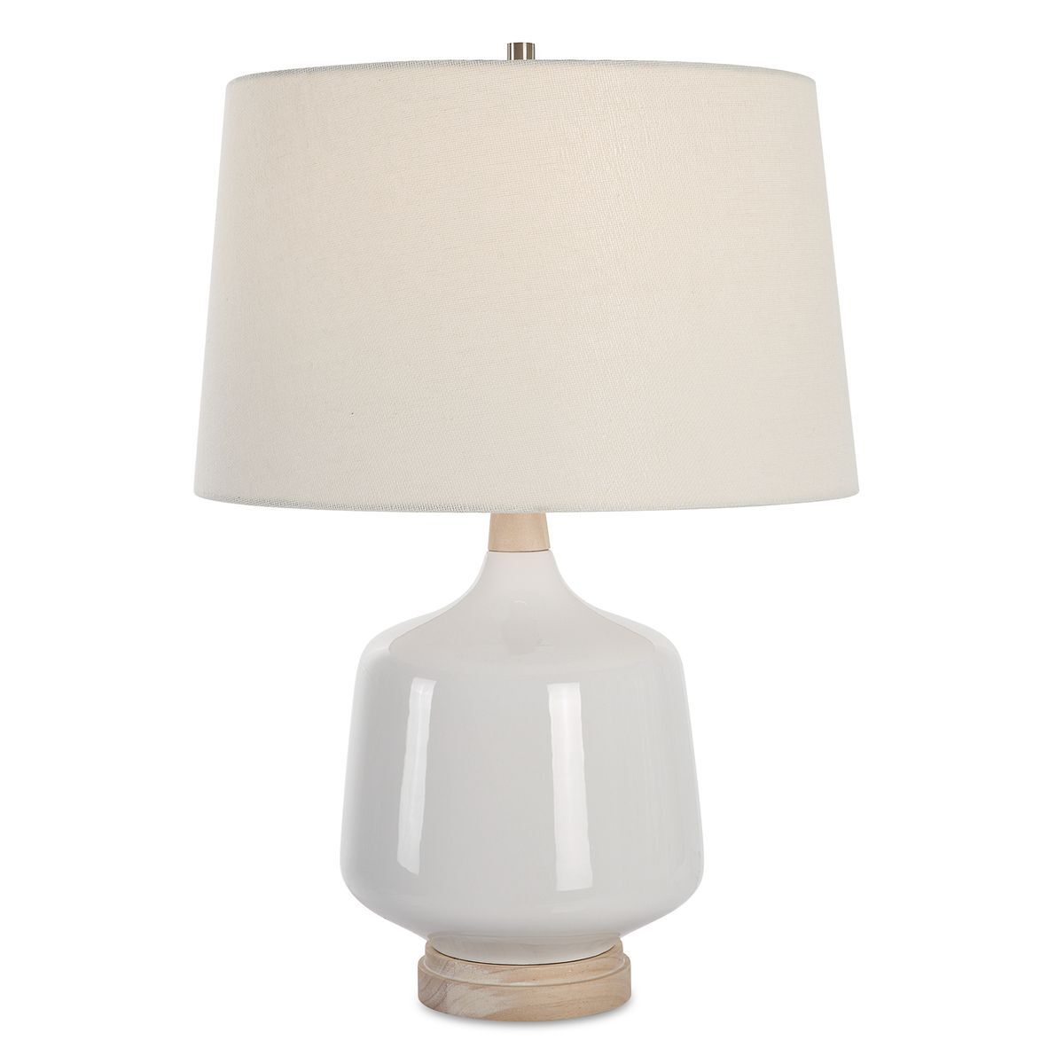Table lamp with a white ceramic base and beige fabric shade on a white background