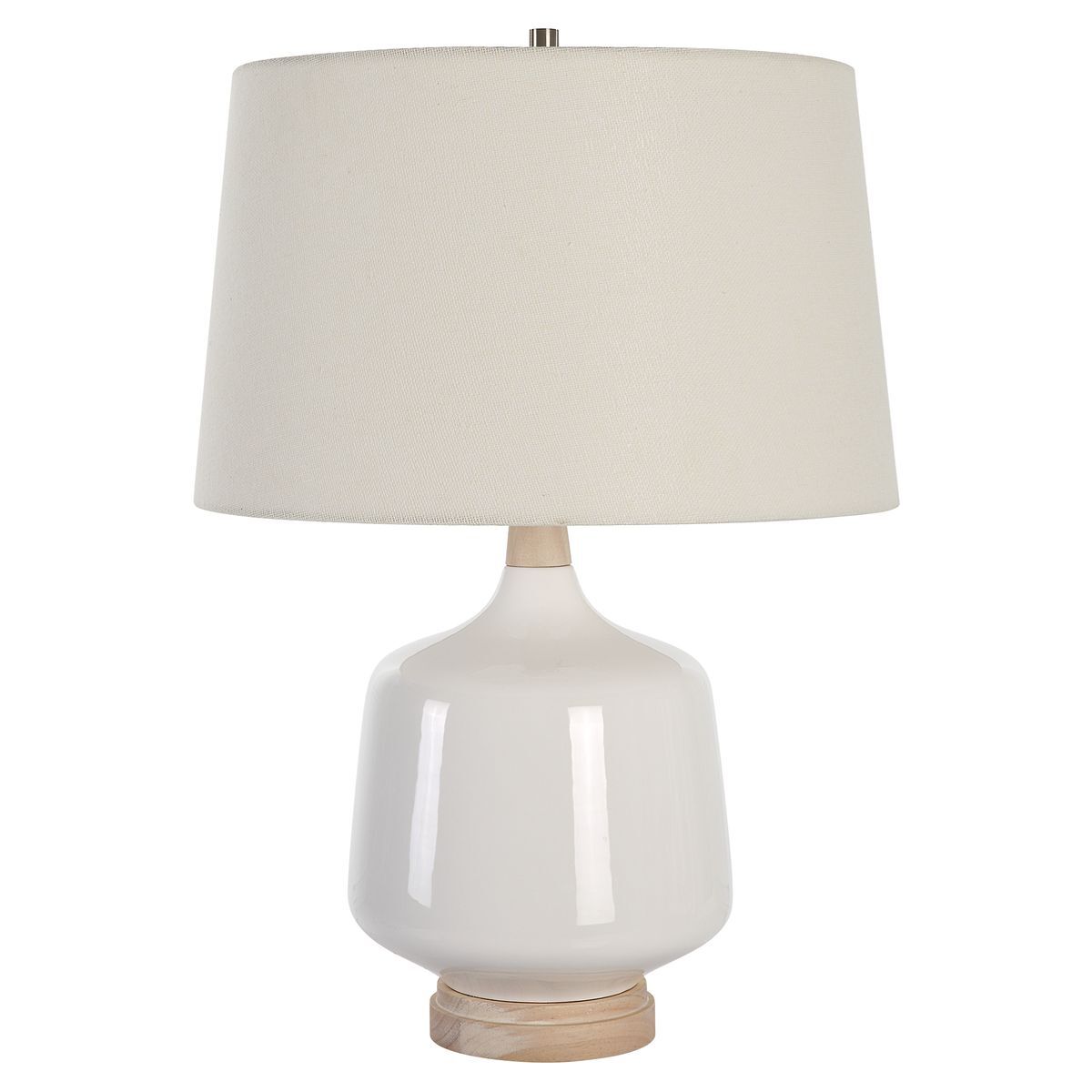 Table lamp with a white ceramic base and beige lampshade on a white background
