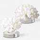 White coral coastal statues.