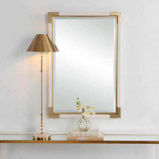 White and gold entryway mirror.