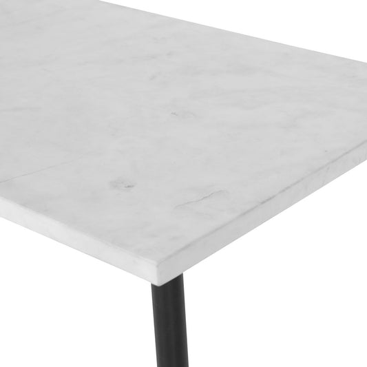 Modern console table with decorative items in a living room setting