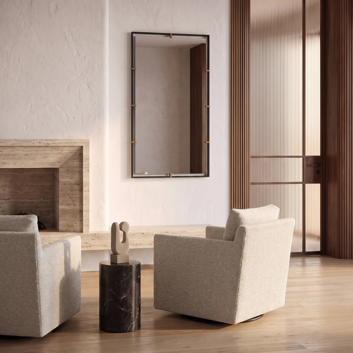 White rocking chairs in living room with two-tone brass and black vertical mirror. Modern room with side table. 