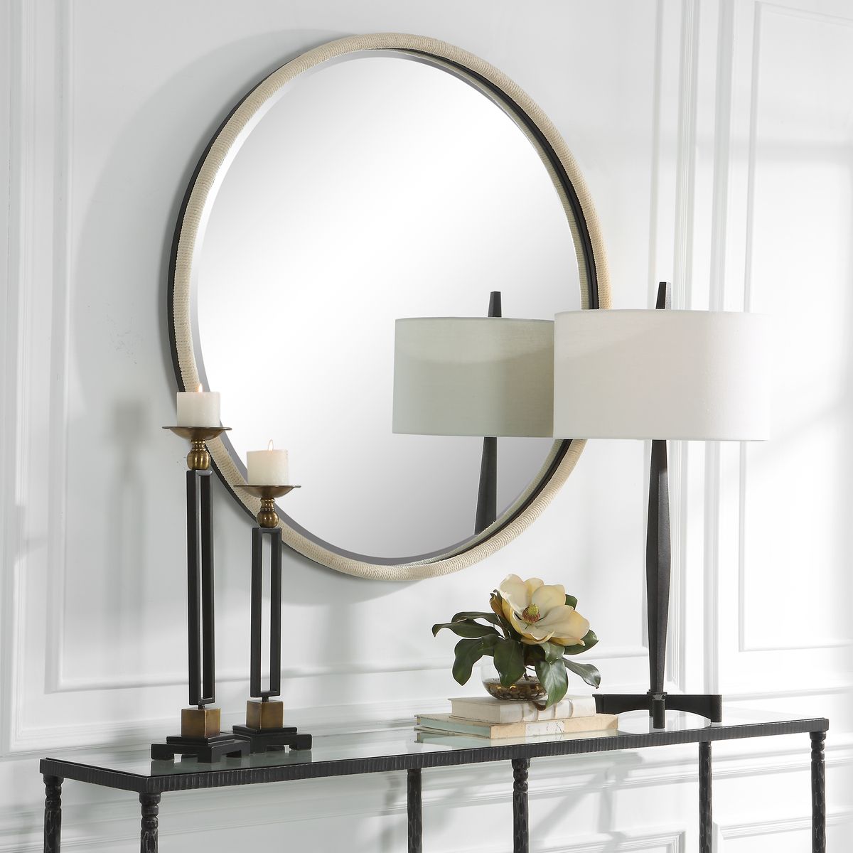 White roped mirror in entryway.