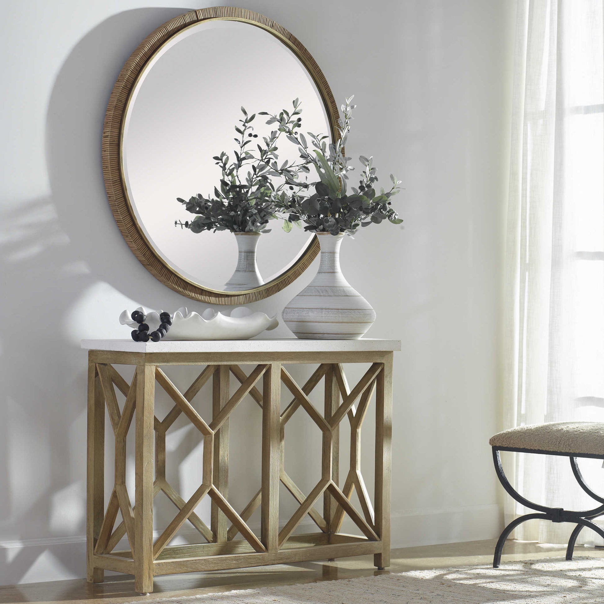 White tray on console table that is farmhouse style.