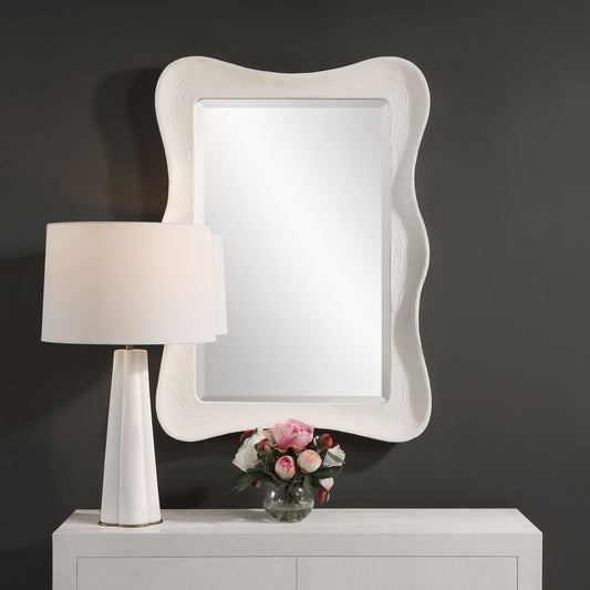 White wavy mirror.