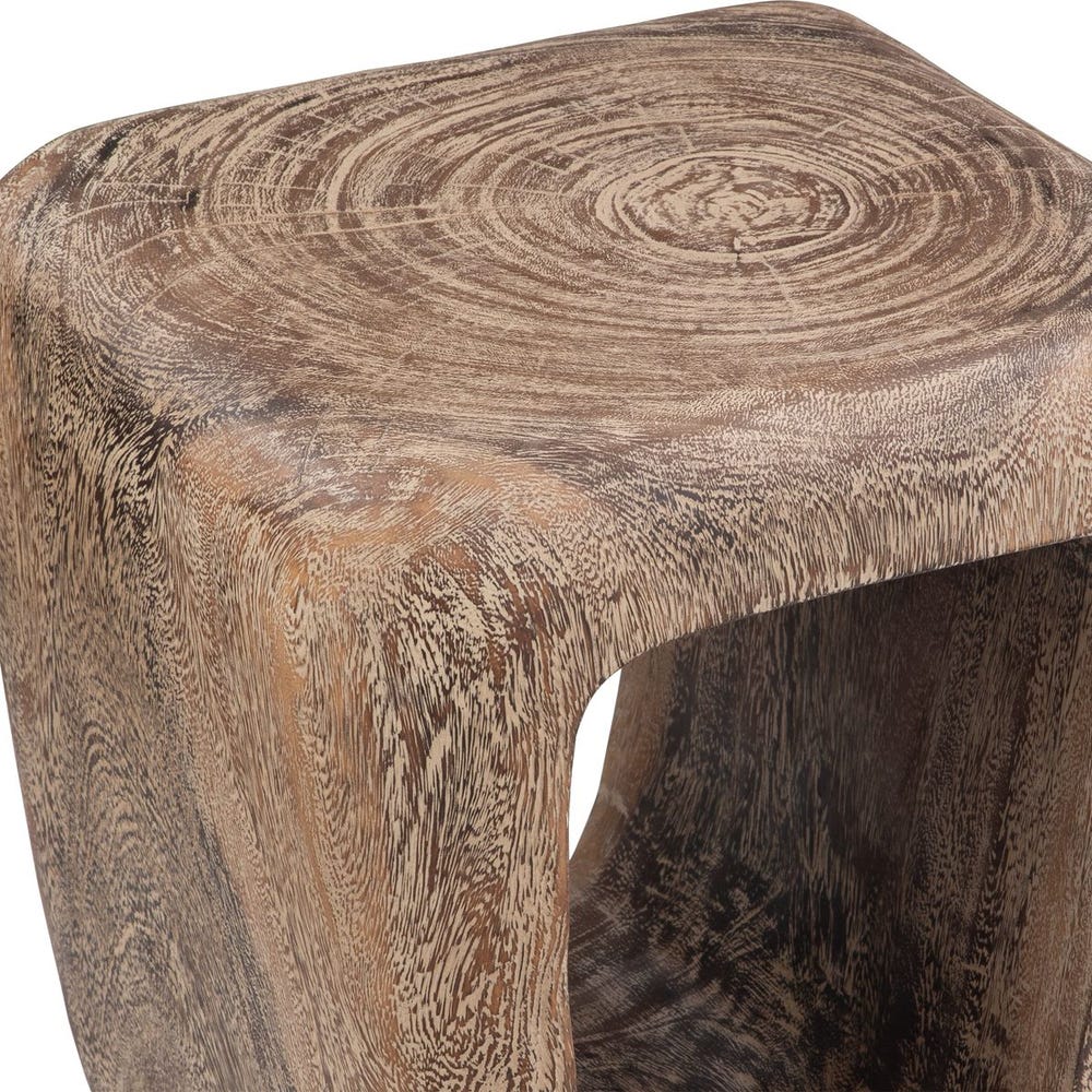 Wooden stool with a rustic, textured surface on a white background