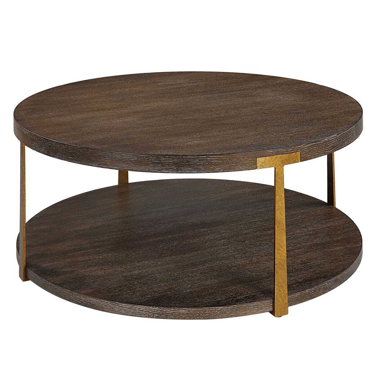 Round wooden coffee table with gold metal legs on a white background