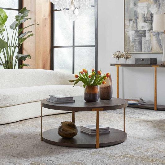 Round wooden coffee table with two levels on a white background
